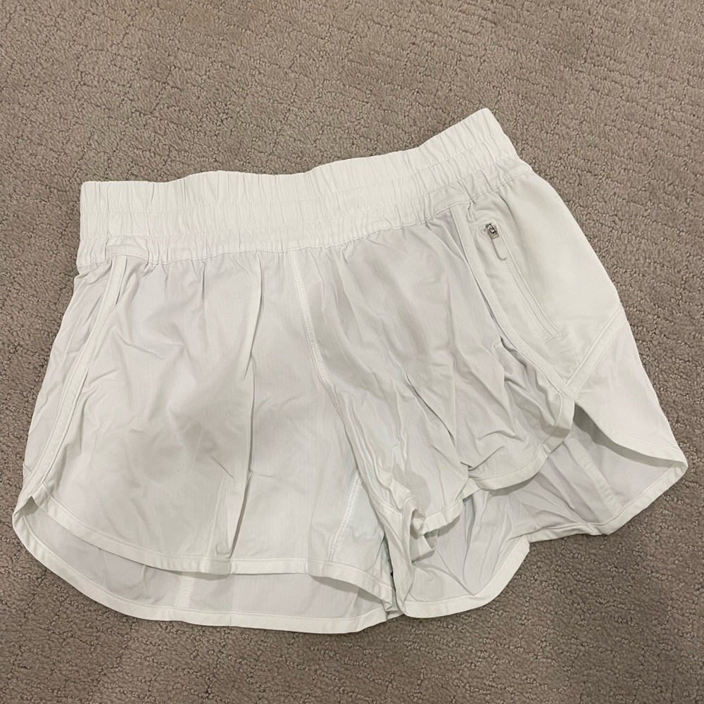 Lululemon track that short. Color:white.